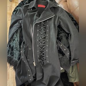 Tripp NYC black trench coat with corset-like ties. In front Size small.